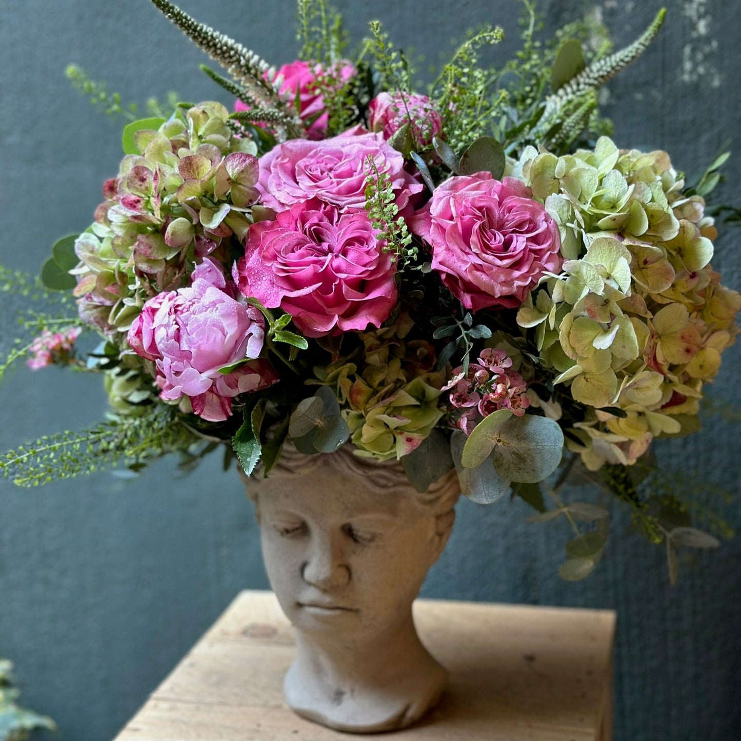 Venus Head with Seasonal Flowers